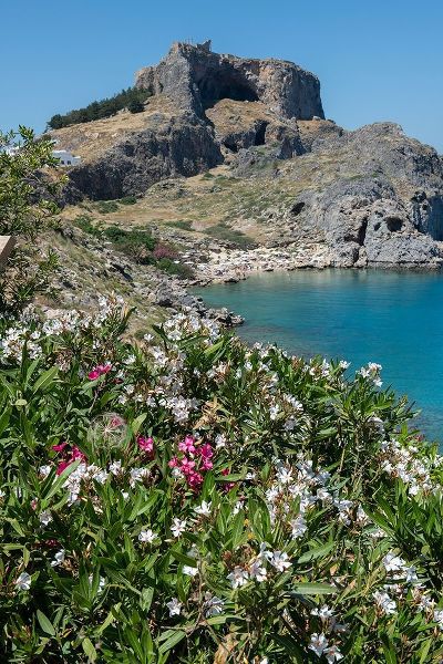 St Pauls Bay with the Acropolis of Lindos in the distance with the Temple of Athena Lindia